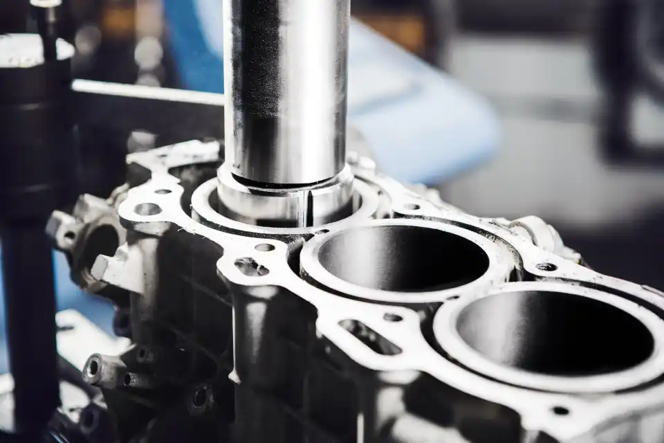 Machined engine block on a workshop bench